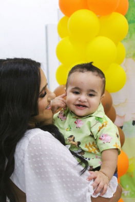 a person holding a baby